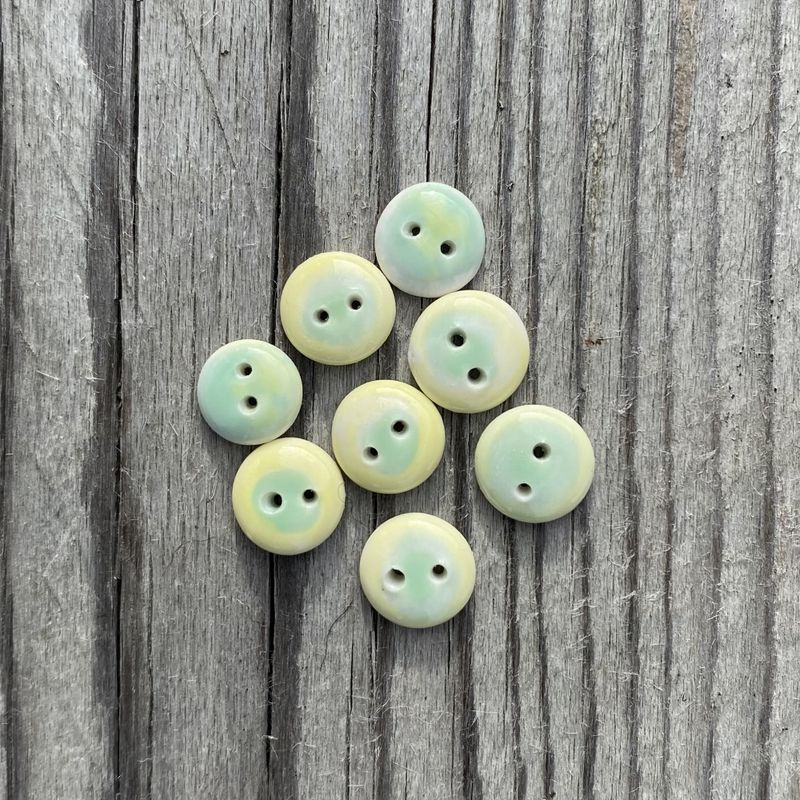Knapper av porselen lys grønn
